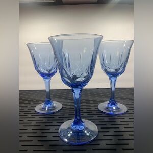 Vintage Avon Fostoria American blue classics goblets in a starburst pattern
